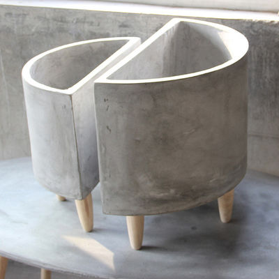 matching semicircle concrete pots suitable to join together or place agianst a wall with legs